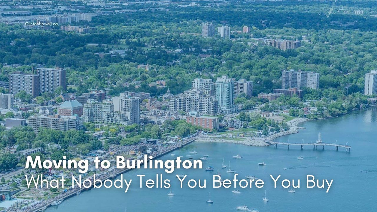 Aerial view of downtown Burlington Ontario waterfront with the marina, pier, and high-rise condos along Lake Ontario